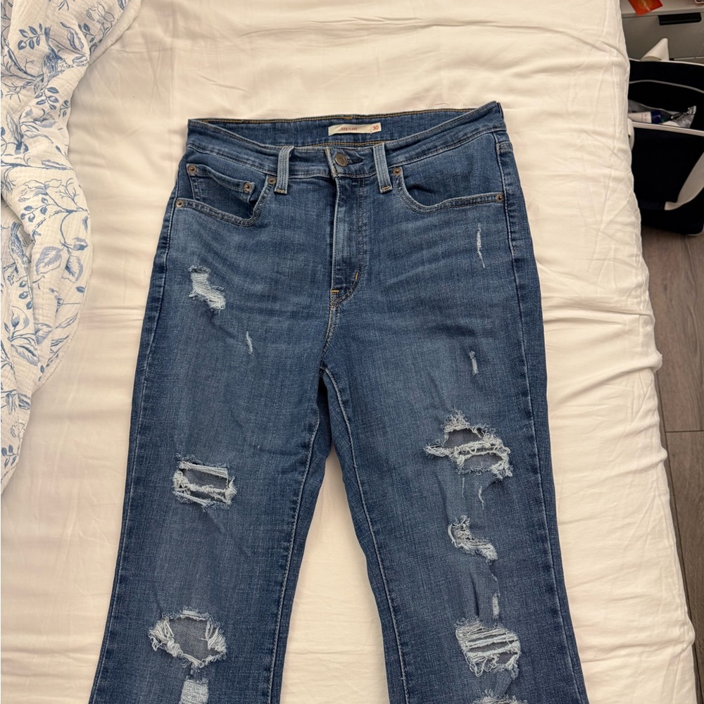 levi’s Distressed flare medium wash Blue Jeans